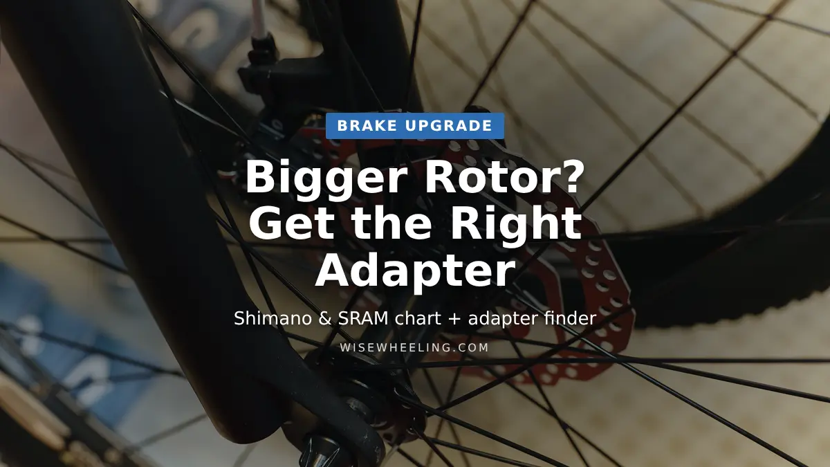 Mountain bike fork with disc brake caliper and rotor, title: Bigger Rotor? Get the Right Adapter